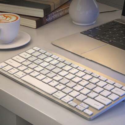 Clavier sans fil Bluetooth portable mini 78 touches, compatible avec les ordinateurs et les tablettes, clavier de bureau, contrôle sans fil en quelques secondes (veuillez lire attentivement le mode d'emploi du produit).