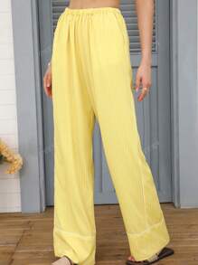 Pantalon jaune rayé à taille élastique, design polyvalent, sens de la mode européen et américain. Nouvelle arrivée printemps/été pour femmes DEEKA