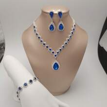 1 par de aretes + 1 collar + 1 pulsera Elegante juego de joyas chapado en plata con incrustaciones de piedras de imitación en múltiples colores para que elijas y combinar con tus atuendos diarios
