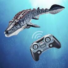 Dinosaure crocodile radiocommandé RC. Le crocodile nage comme un vrai crocodile, peut nager dans l'eau ou dans la piscine, avec fonction jet d'eau, facile à utiliser, c'est le cadeau parfait pour les enfants