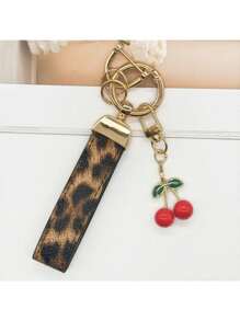 TTOBS 1 Llavero con estampado de leopardo hecho a mano con colgante de cereza - Práctico y versátil llavero ideal para mochilas. Regalo perfecto para el Día de San Valentín o para esa dama especial.