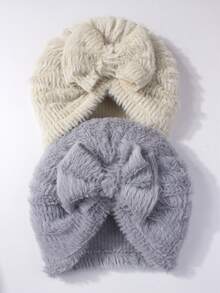 2顶蝴蝶结装饰婴儿帽，弹性柔软，日常佩戴舒适，适合0-2岁宝宝。