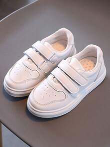 Zapatillas deportivas para niños con diseño de cierre adhesivo: diseño de media caña, fabricadas con materiales duraderos de PU y PVC, y forro interior de tela suave. Zapatillas de lona transpirables para niñas, aptas para niños y niñas, en colores lisos clásicos, ideales para tenis femenino, tenis infantil, colegio, deporte y uso diario. - Blanco - Ver 2