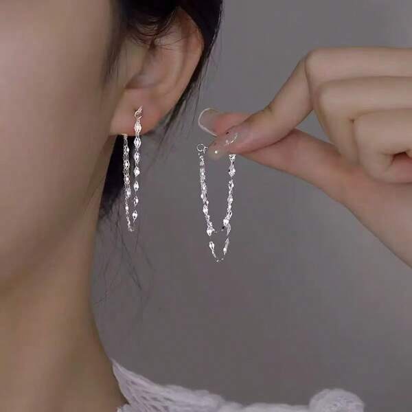 1 par de pendientes con cadena con forma de labios y flecos delante y detrás