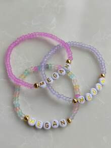 1 سوار شخصي شفاف ملون محبب بتصميم اسم، سوار مطاطي بسيط، قابل للتركيب، هدية شخصية، سوار صداقة، سوار للنساء، سوار متطابق، ملصق اسم شخصي، سوار حبيبات متعدد الألوان، هدية عيد الميلاد، هدية للأم/الأسرة/الأصدقاء، مناسب ليوم الأم، الزفاف، هدية وصيفة العروس، عيد الحب، هدية عيد الميلاد، مناسب للاستخدام طوال العام - متعدد الألوان - مشاهدة 2