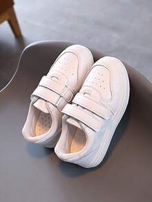 Zapatillas deportivas para niños con diseño de cierre adhesivo: diseño de media caña, fabricadas con materiales duraderos de PU y PVC, y forro interior de tela suave. Zapatillas de lona transpirables para niñas, aptas para niños y niñas, en colores lisos clásicos, ideales para tenis femenino, tenis infantil, colegio, deporte y uso diario. - Blanco - Ver 5