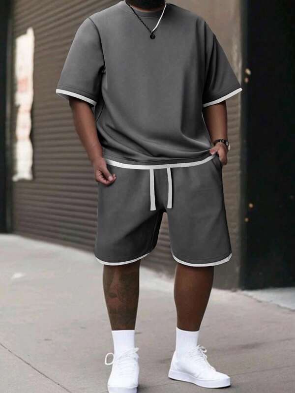 Conjunto de camiseta de manga corta de cuello redondo y unicolor con pantalón corto de cintura con cordón, ajuste global, para hombres