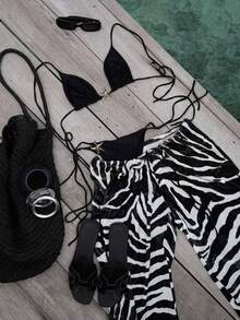 Bộ bikini tam giác họa tiết sao biển và quần ống rộng in họa tiết ngựa vằn dành cho nữ. Được làm từ chất liệu co giãn cao, thân thiện với da, mang lại sự thoải mái và thoáng khí. Áo bikini tam giác với khóa kim loại hình sao biển rất thời trang và bắt mắt. Quần ống rộng in họa tiết ngựa vằn đồng bộ mang đến vẻ ngoài giản dị và thoải mái. Thiết kế phối màu mang hơi hướng cổ điển, lý tưởng cho các kỳ nghỉ và những chuyến đi biển, là lựa chọn hàng đầu cho một diện mạo độc đáo. Màu đen mùa hè - màu đen - Xem 5