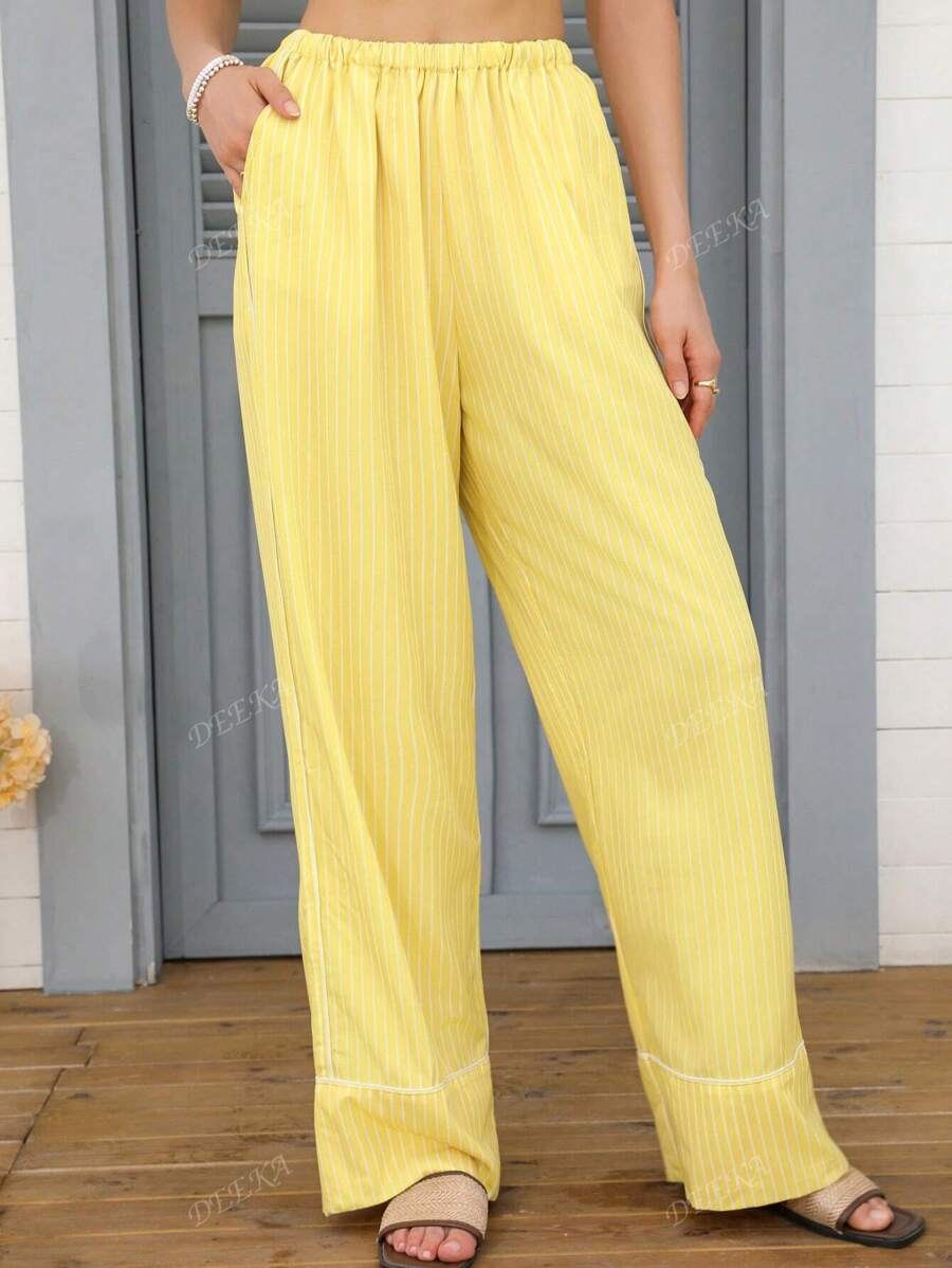 Pantalon jaune rayé à taille élastique, design polyvalent, sens de la mode européen et américain. Nouvelle arrivée printemps/été pour femmes DEEKA
