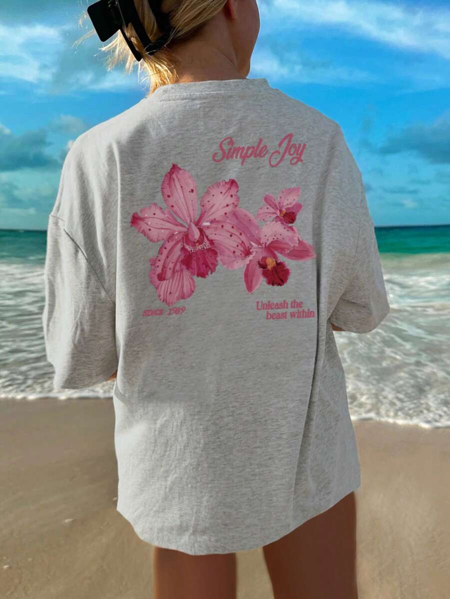 这款色彩缤纷的字母花卉印花圆领T恤,时尚百搭,适合女性穿着。图案T恤,有白色和粉色可选,是度假穿着的理想之选。 - 灰色 - 查看 1