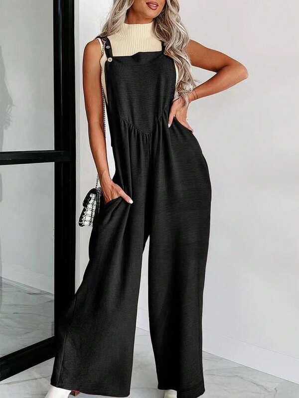 Mono de mujer de pierna ancha con bolsillo y botones