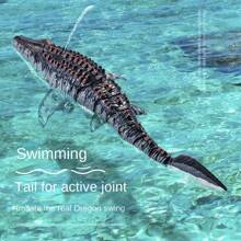 Dinosaure crocodile radiocommandé RC. Le crocodile nage comme un vrai crocodile, peut nager dans l'eau ou dans la piscine, avec fonction jet d'eau, facile à utiliser, c'est le cadeau parfait pour les enfants