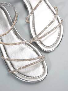 女士夏季新款露趾绑带交叉松紧带平底凉鞋，欧美风格，沙滩装扮 - 銀色 - 查看 9