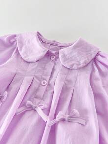 秋季女婴蝴蝶结粉色连体衣