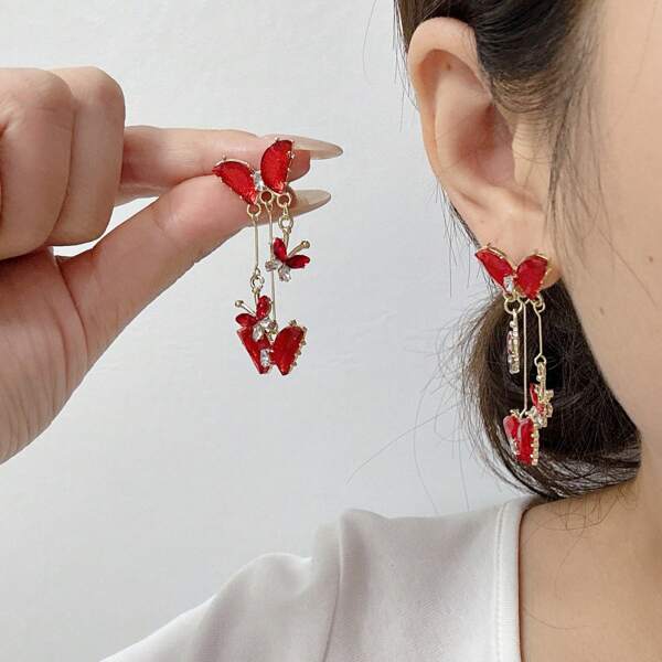 1 paire de boucles d'oreilles longues en forme de papillon, élégantes et à la mode, pour femme
