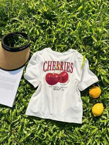 女式夏季白色樱桃和口号图案圆领短袖 T 恤，休闲宽松百搭假日风格上衣，时尚夏季服装适合日常假日穿着