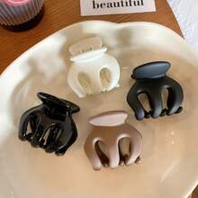 4 chiếc kẹp bí ngô đen trắng sáng màu cà phê đen