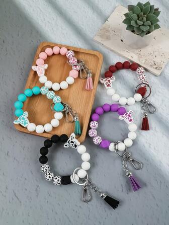 1pc Bohemian Silicone Cow Animal Print Wood Bead Tassel Charm Bracelet Keychain Bag Pendant Accessory, Gift For Friends And Family Car Accessories Cute Goth Y2k Bag Accessories Lanyards With Id Holder Car Accessories Bag Charms Christmas Car Teacher Sister Gift Ideas
