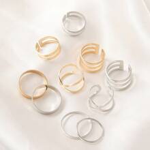 Set de 10 anillos de metal con junturas geométricas clásicas, en color dorado y plateado