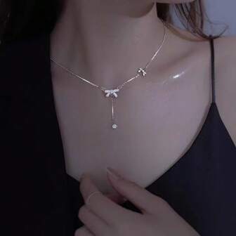 1 pieza Collar de clavícula versátil minimalista y elegante de acero de titanio con mariposa y borla