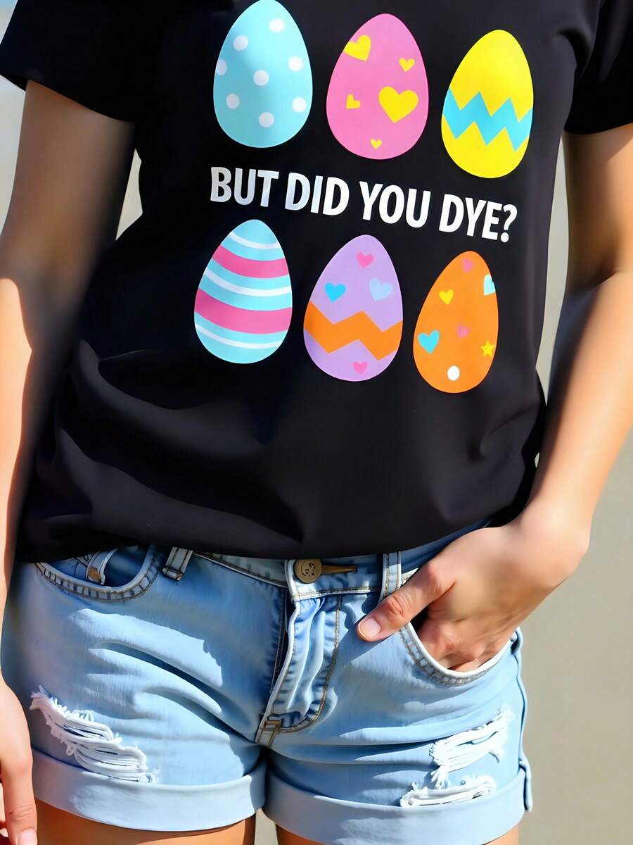 Camiseta gráfica de manga corta con cuello redondo y estampado de huevo de Pascua en algodón negro de 180 g para mujer. "¿Pero teñiste?". Traje informal y divertido de Pascua para mujer, talla grande. - Negro - Ver 1