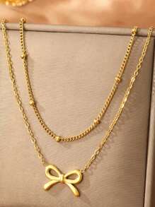 1 colar com pingente de laço minimalista e luxuoso de aço inoxidável, design de gargantilha em camadas, adequado para mulheres, uso diário ou eventos importantes, ótimo presente para namorada/melhor amiga (sem caixa de presente)