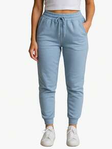 Pants Jogger Dama Deportivo Para Mujer Confortable y Cómodo Con Jareta Cordón o Cinta De Ajuste De Color Solido Negro, Gris, Lila Púrpura, Rosa Fiusha, Azul, Marrón, Rosa Coral, Menta y Celeste Con Bolsillos y Puño Elástico Casual Moderno y Spandex - Azul Claro - Ver 1
