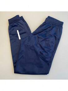 MEN'S SPORTY JOGGER PANTS WITH REFLECTIVE SYMBOL THAT SHINES IN -