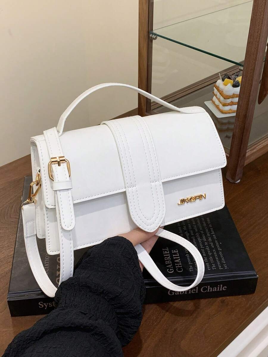 Niche Vintage Handbag: High-End Fashion Single-Shoulder Versatile Textured Small Square Bag, Crossbody/Top-Handle Design. Light Luxury Letter Solid Color Handheld Small Square Bag With Elegant Appeal.