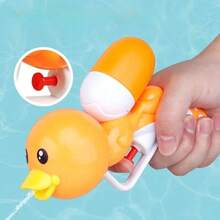 Bonita pistola de agua con forma de patito amarillo para niños: el juguete acuático perfecto para la playa en verano.