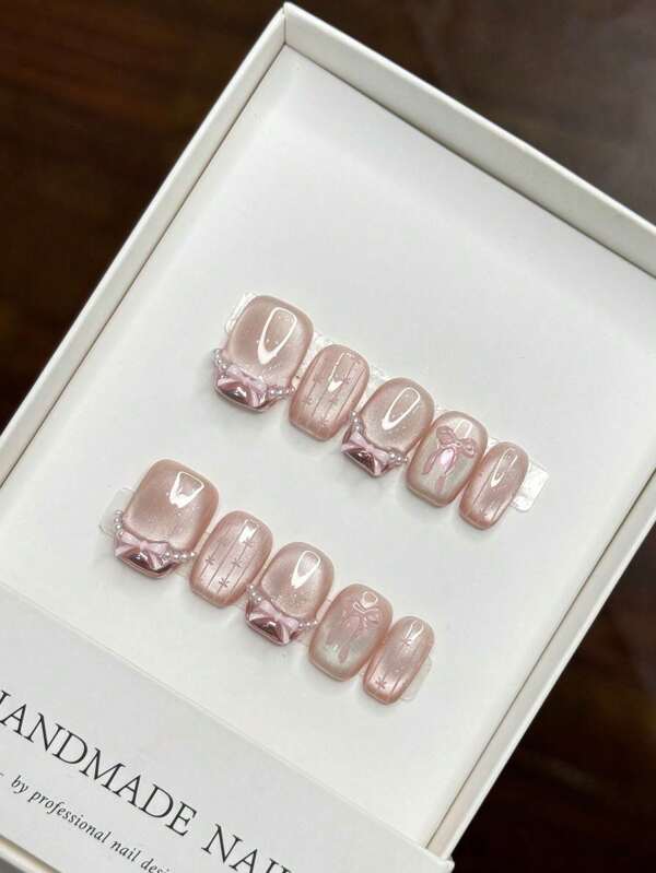 Uñas postizas francesas hechas a mano en diseño de lazo con perlas falsas en color rosa extra corto y cuadrado, accesorios de arte de uñas