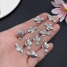 20/30/50 piezas Colgantes de aleación con diseño de lindo pez en color plata envejecida de 10x19mm para hacer joyas, accesorios DIY de pulsera, collar y aretes con temática marina