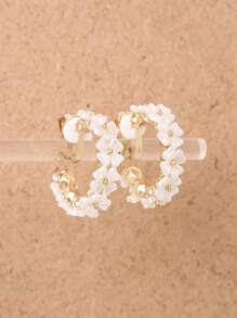 1 paire de boucles d'oreilles clip-on en forme de fleur pour femmes, accessoire mode minimaliste polyvalent