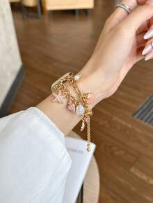 1 chiếc Dây đeo kim loại thay thế có thể điều chỉnh hình nàng tiên cá đại dương mơ mộng màu hồng cho nữ, sao biển, vỏ sò, trang trí ngọc trai giả, phù hợp với kích thước 38mm/40mm/41mm/42mm/44mm/45mm/46mm/49mm, Series Ultra/SE/S10/S9/8/7/6/5/4/3/2/1. Thời trang và phù hợp cho mùa xuân, mùa hè, mùa thu, mùa đông, món quà lý tưởng cho mẹ, bạn gái, vợ, bạn bè. Có thể đeo khi đi làm, dự tiệc, hẹn hò và trang phục thường ngày. - Hồng - Xem 3