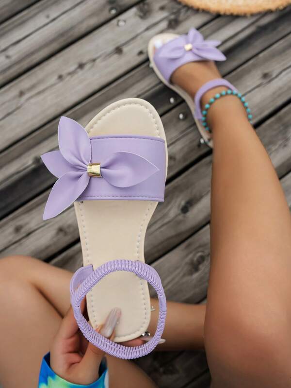 Sandalias planas de dedo redondo para mujer con tira, diseño de hojas de árbol y lazo, cómodas y versátiles para el estilo casual de playa y vacaciones