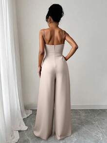 Pantalón mono de mujer con tirantes, pliegues, cintura ajustada y pierna ancha, en color liso. Conjunto de dos piezas para mujer con top sin tirantes y pantalón ancho. Ideal para fiestas, reuniones y cenas formales. - Albaricoque - Ver 3