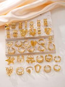 Juego de anillos de acero inoxidable chapado en oro de 18K, con diseño elegante y versátil, con grabados aleatorios, adecuado para hombres y mujeres para uso diario, días festivos, compromiso, boda o como regalo