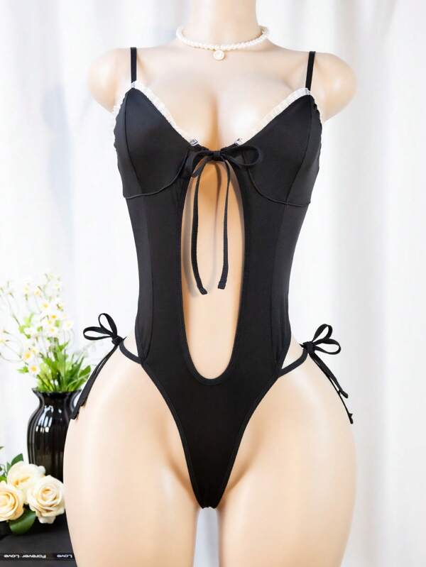 1 pieza Mono sexy de mujer de cintura alta con recortes y cordones en negro, adecuado para la playa y el verano, disfraz de sirvienta para juegos de rol, decoración de encaje blanco, mono de una pieza con cordones delanteros, tirantes ajustables para rave