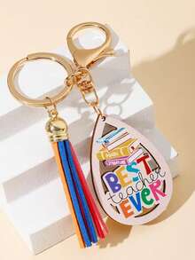 1pc Minimalist Fashionable Wooden Shield Keychain With Pencil Pattern Tassel, Creative Street Style Accessory, Unisex Backpack Charm, Single Party Souvenir Gift