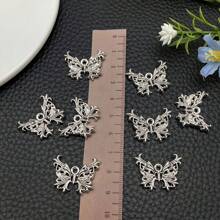 10/20/30 piezas Colgante de mariposa hueco de aleación de plata antigua, lindo colgante de insecto animal para hacer pulseras, collares, aretes, manualidades y accesorios de joyería, 25x19mm