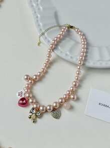 1 pieza Collar con corazón y lazo de perla de champán, elegante y de moda, collar de lujo ligero y delicado adorno de cadena para la clavícula