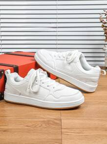 Zapatillas minimalistas blancas cómodas y versátiles, zapatos de moda casuales para ir al trabajo, caminar y hacer skateboard para hombres