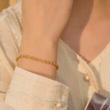 1 pieza Pulsera de acero inoxidable de color dorado con cadena trenzada, accesorio versátil de uso diario para mujeres