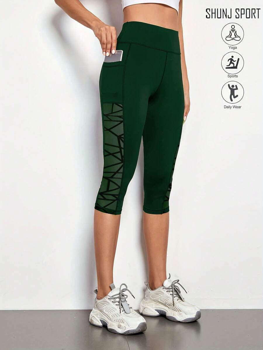 Quần tập yoga lưới hình học cho nữ, Quần legging chạy bộ nhanh khô thoáng khí màu đen, Quần tất Capri tập thể dục ngoài trời, Quần tập yoga lưới vá cho nữ, Quần short thể thao cạp cao, Quần bó có túi cho phòng tập thể dục mùa thu mới cho nữ - Màu xanh lá cây đậm - Xem 1