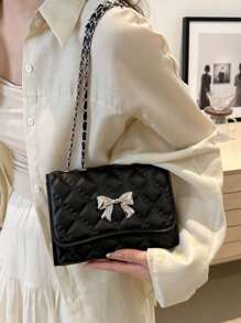Bolso de hombro acolchado con decoración de mariposa y lazo, bolso cruzado pequeño y elegante con cadena para mujer 2024