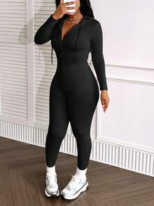 LovelyWholesale Set da donna casual composto da top con cappuccio, maniche lunghe e chiusura lampo, e pantaloni skinny chic, un completo in due pezzi