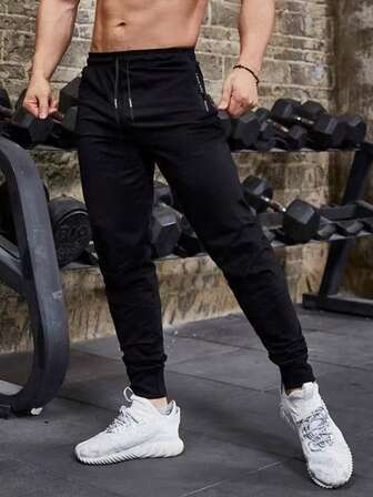 Herrsportbyxor, avsmalnande byxor för utomhuslöpning och fitness, andningsbara, snabbtorkande, elastiska byxor