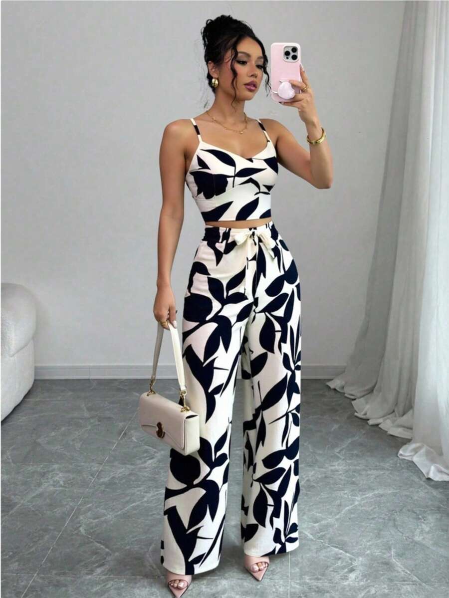 2 piezas Conjunto de top de camiseta elástica de tirantes finos y pantalones de pierna ancha con lazo delantero para mujer Conjunto de dos piezas para mujer, estilo bohemio, con estampado de lunares, camiseta sin mangas y lazo de pierna ancha. - Blanco y Negro - Ver 1