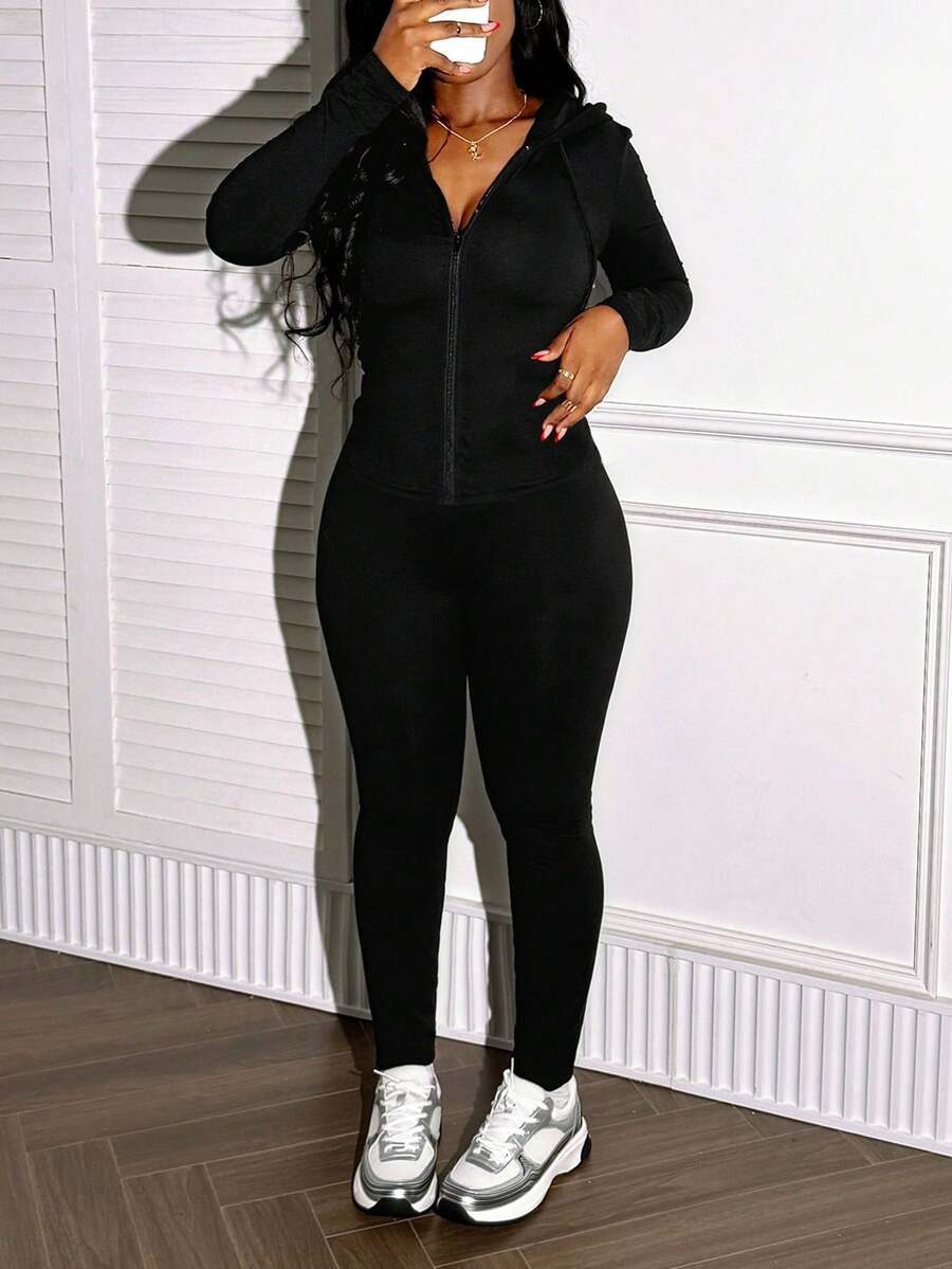 LovelyWholesale Set da donna casual composto da top con cappuccio, maniche lunghe e chiusura lampo, e pantaloni skinny chic, un completo in due pezzi