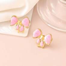 1 paire de boucles d'oreilles florales exquises à effet d'écoulement d'huile, clous d'oreilles élégants, uniques et délicats, de luxe. Bijoux de tempérament doux.